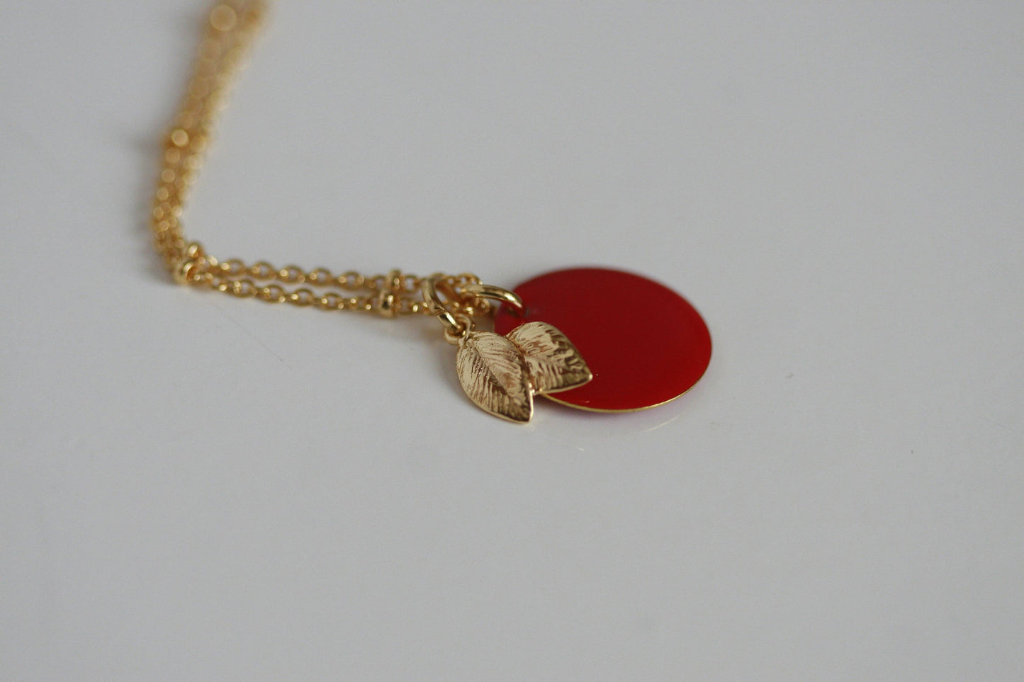 Kaiko Red Apple & Gold Leaf Necklace | Golden Orchard