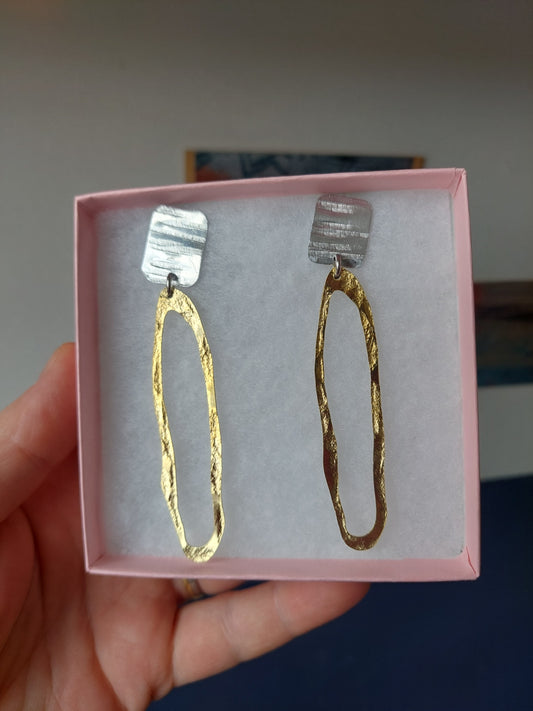 Earrings by Daki Daki.